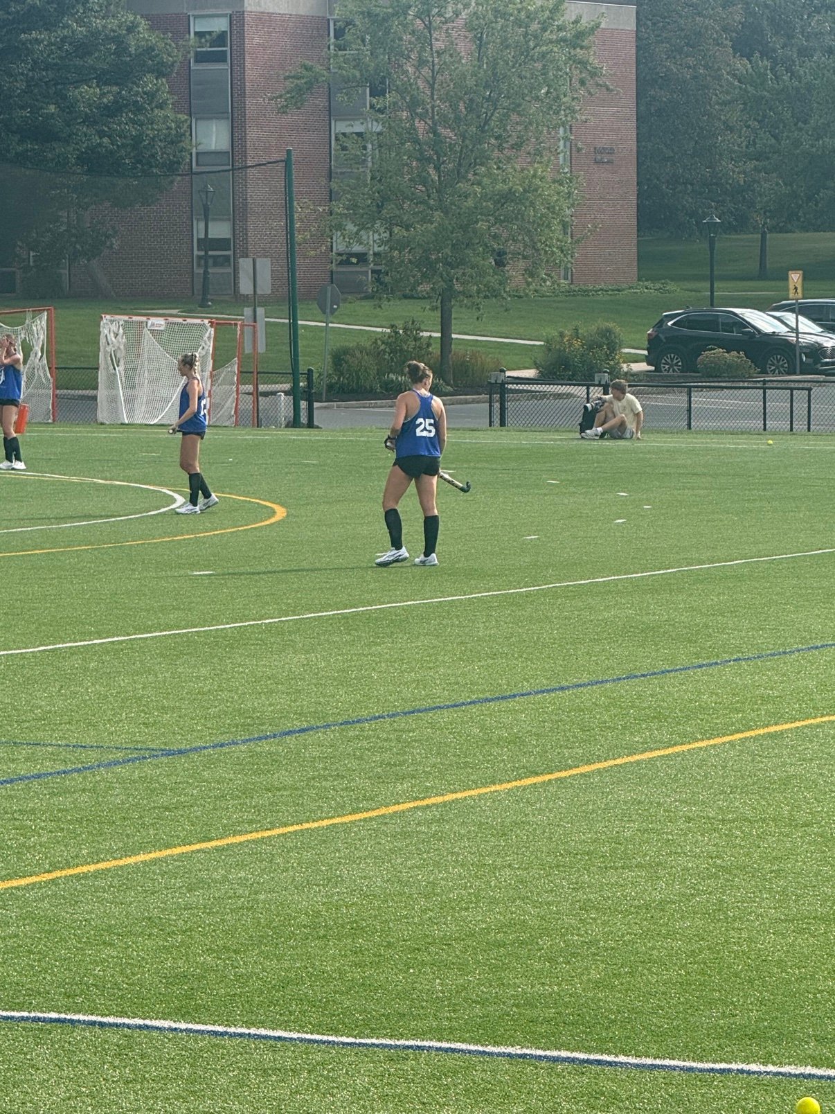 Caroline Hartley playing field hockey